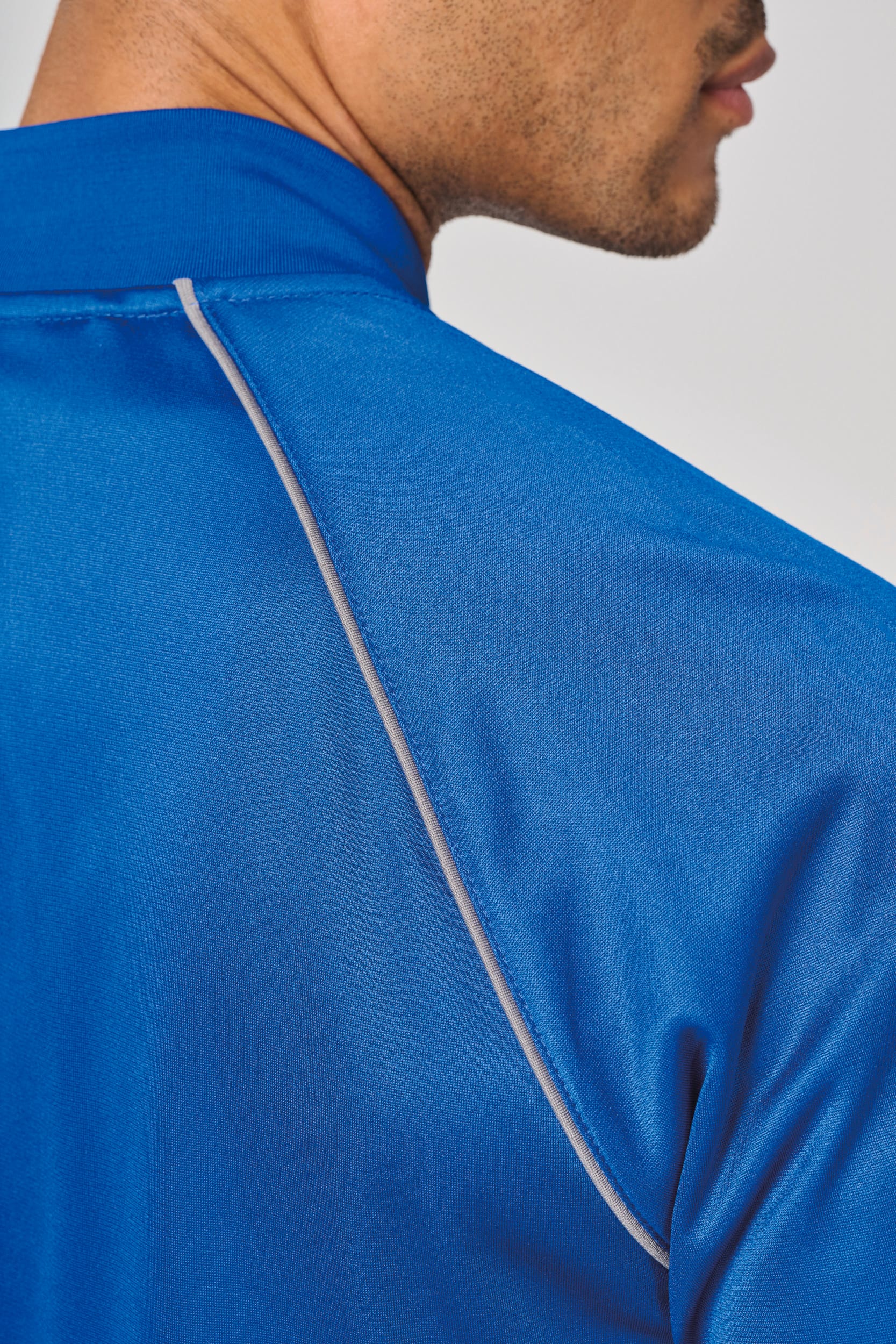 Unisex-Trainingsjacke mit Reißverschluss und Paspel