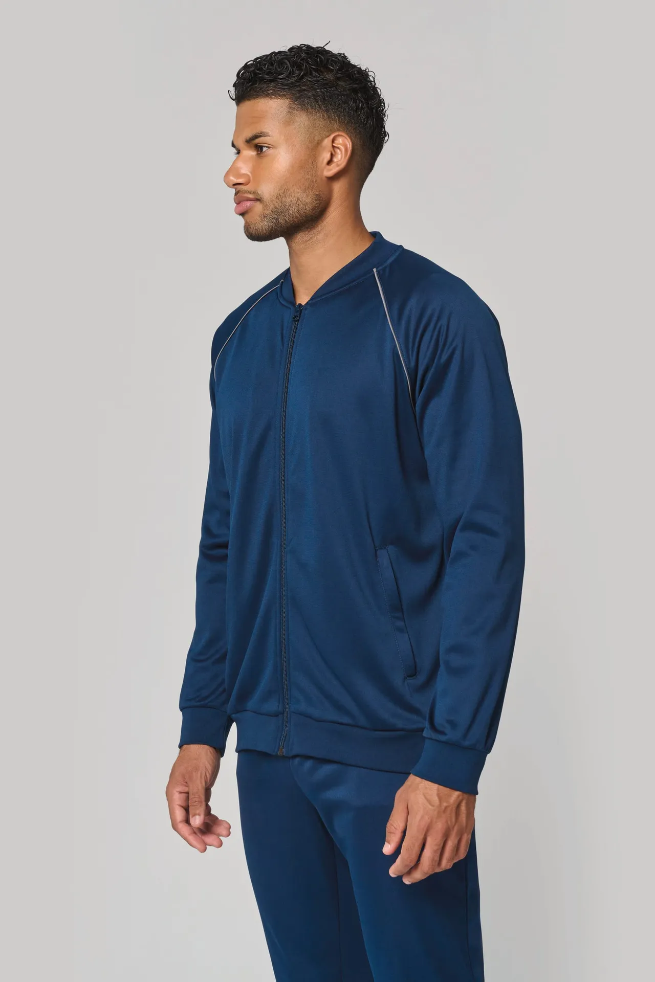 Unisex-Trainingsjacke mit Reißverschluss und Paspel