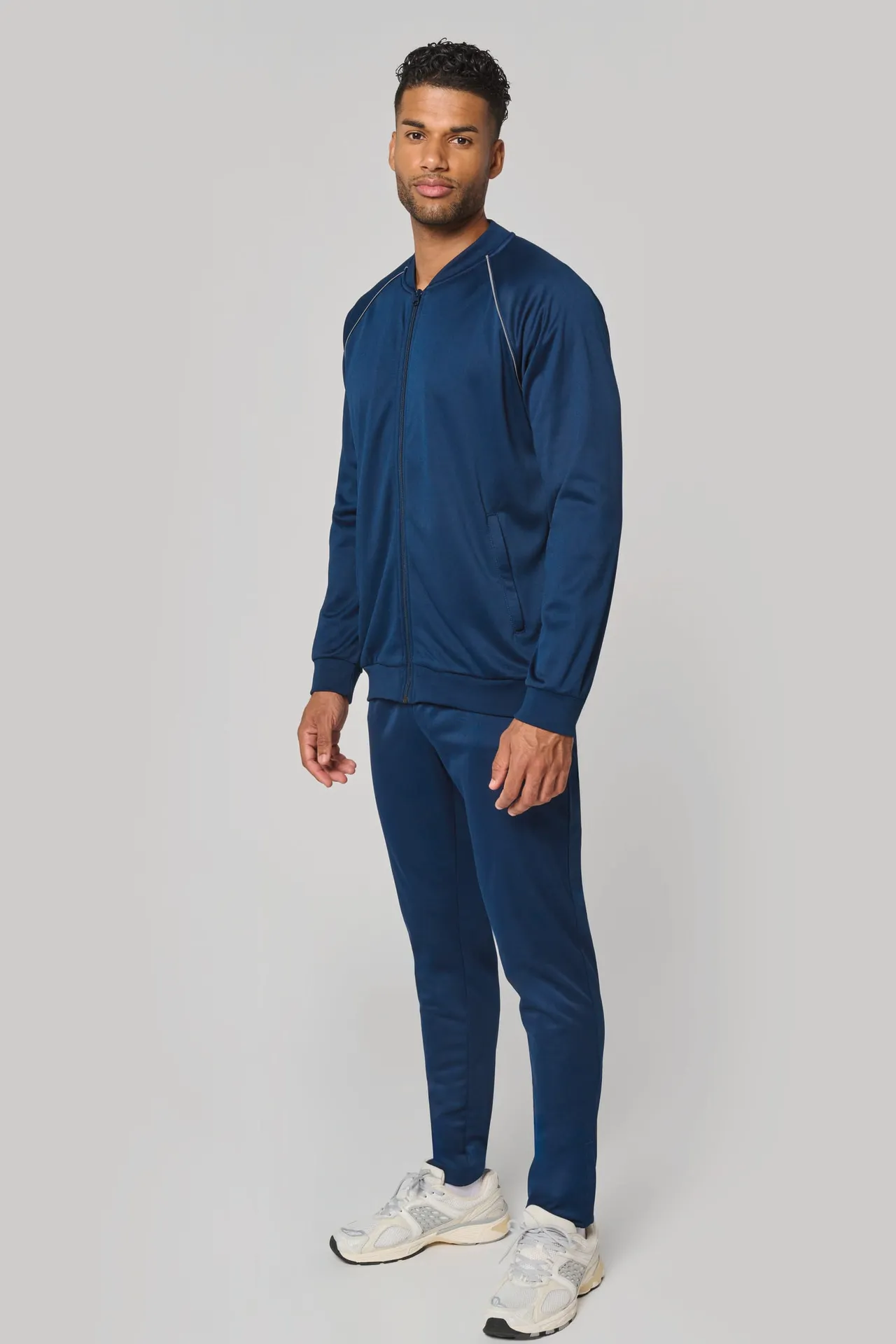 Unisex-Trainingsjacke mit Reißverschluss und Paspel