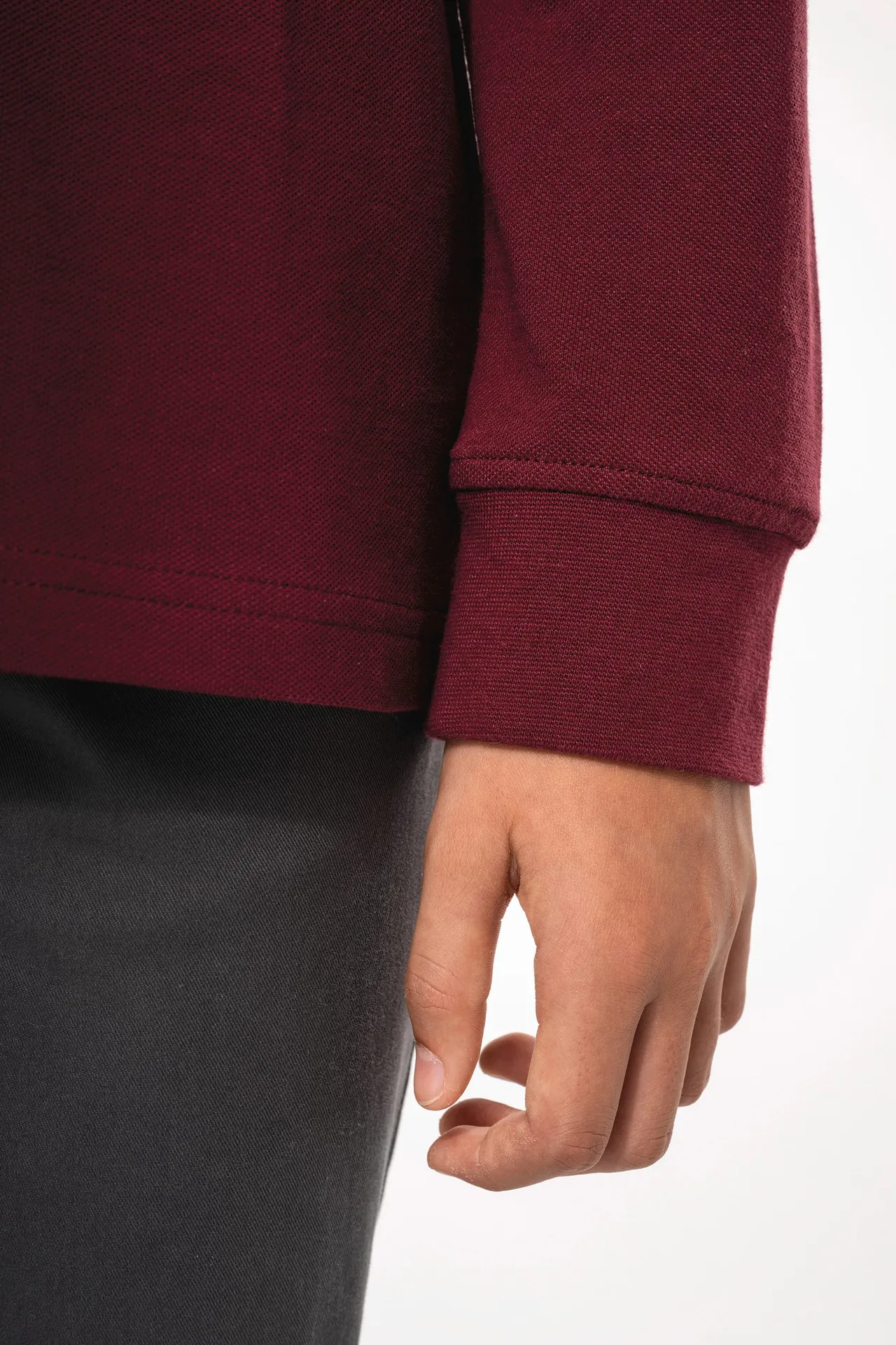 Polohemd mit langen Ärmeln für Kinder.