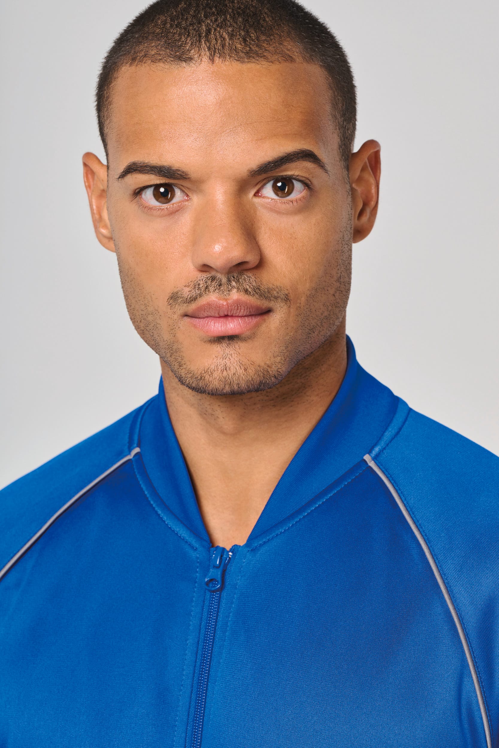 Unisex-Trainingsjacke mit Reißverschluss und Paspel