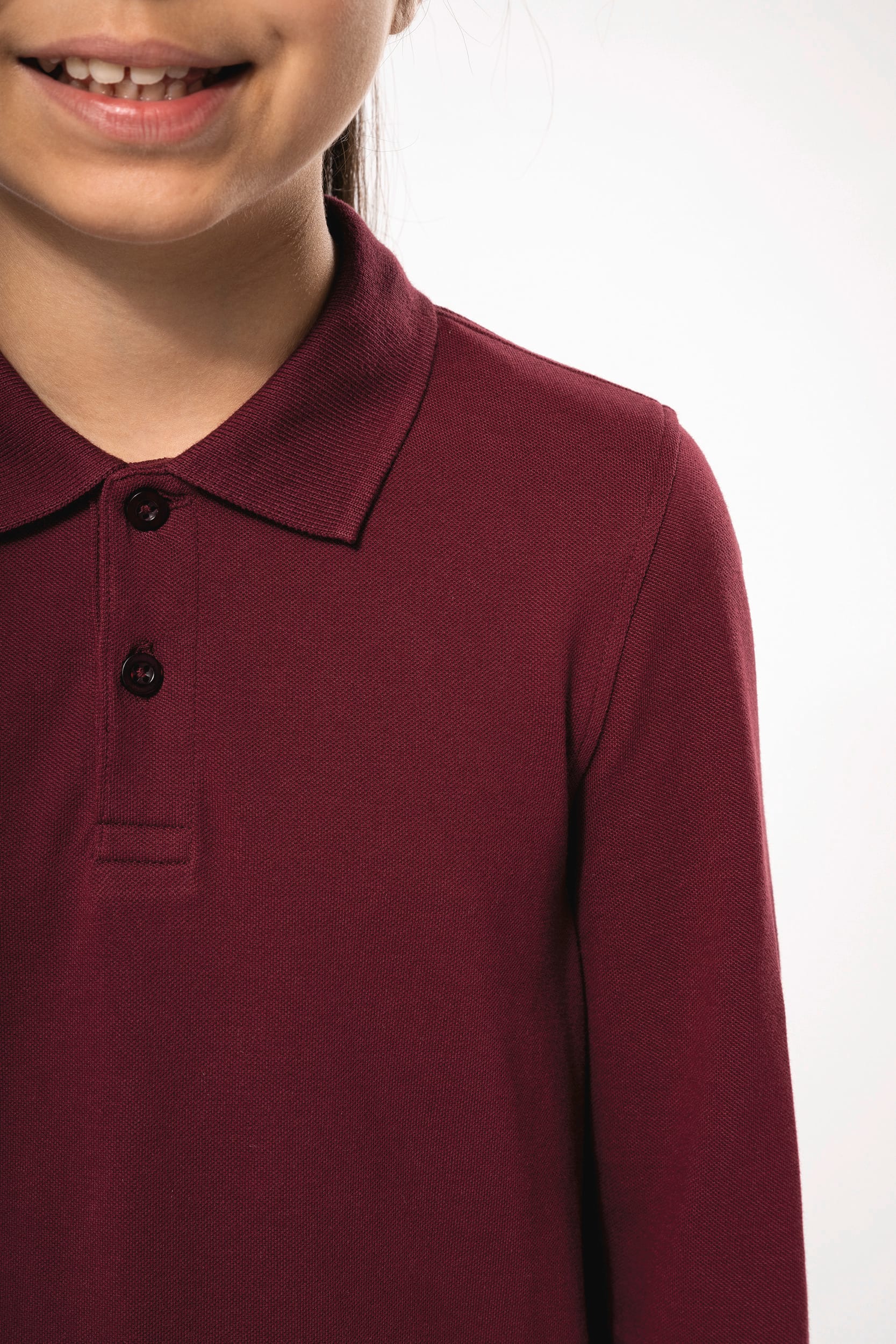 Polohemd mit langen Ärmeln für Kinder.