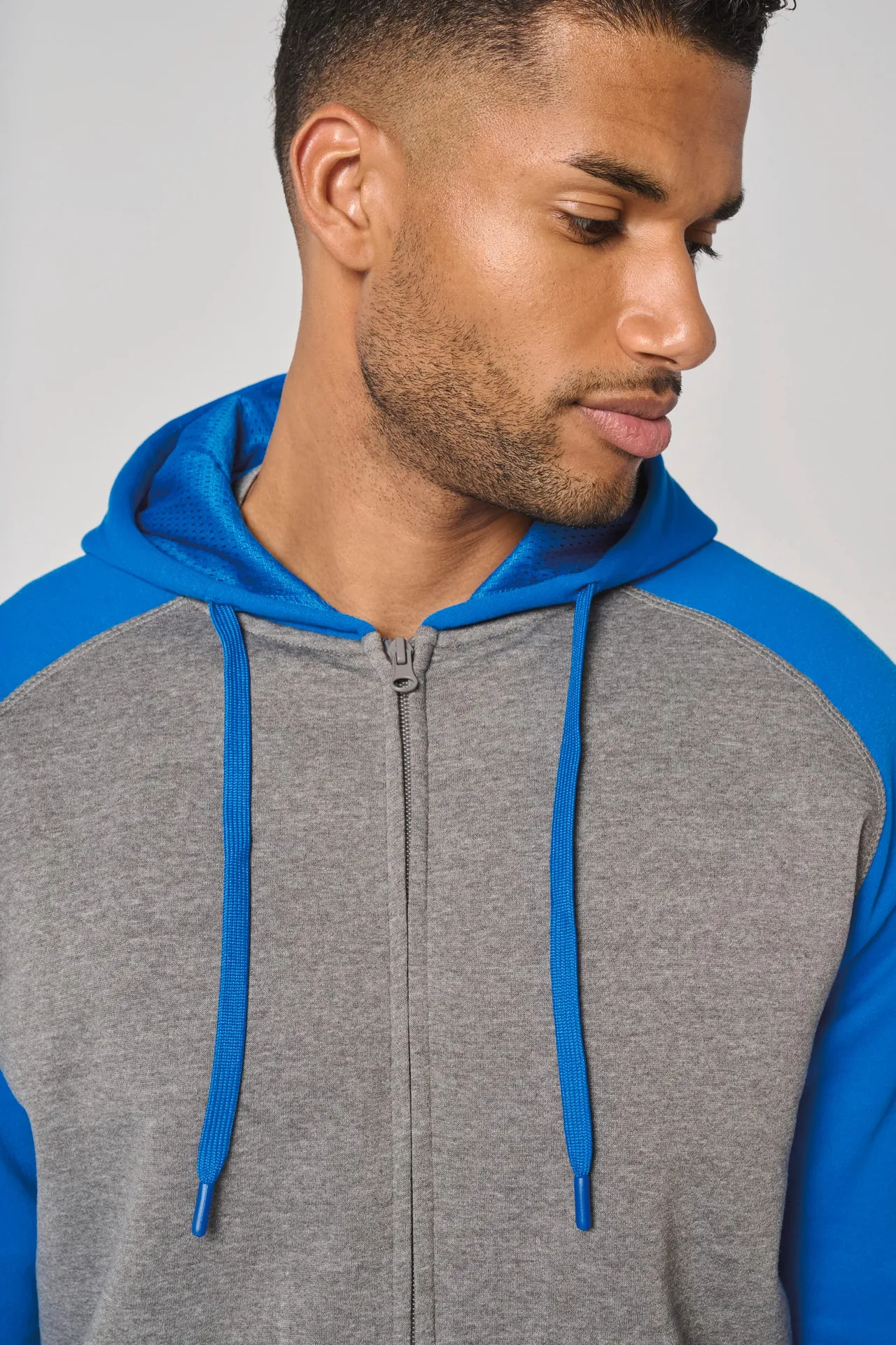 Zweifarbige Unisex-Fleecejacke mit Reißverschluss und Kapuze